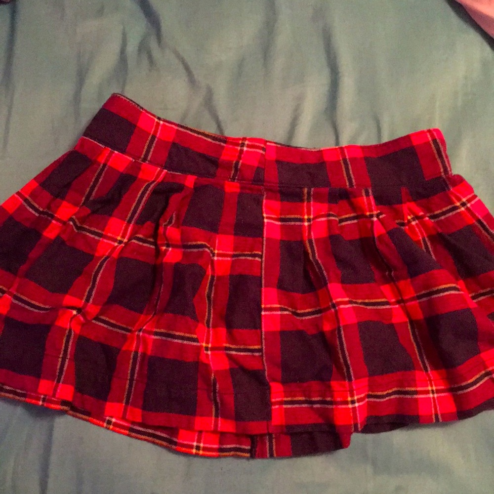 This red mini shirt has only been worn once!